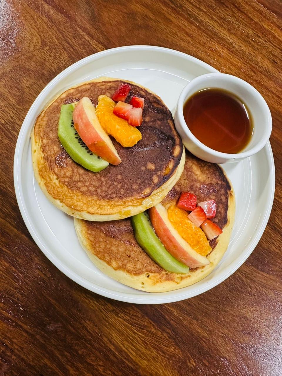 Fluffy Signature Pancakes at Bloom Breeze