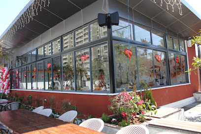 Bloom & Breeze Atmosphere - Cozy Seating area on Hennur-Bagalur Main Road